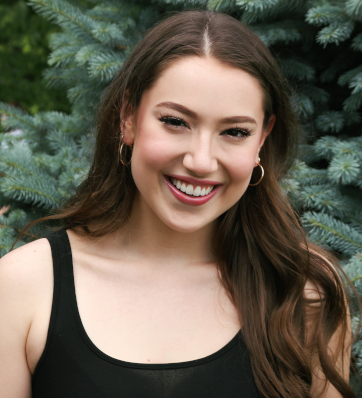 Radiant Smile amidst Majestic Greenery